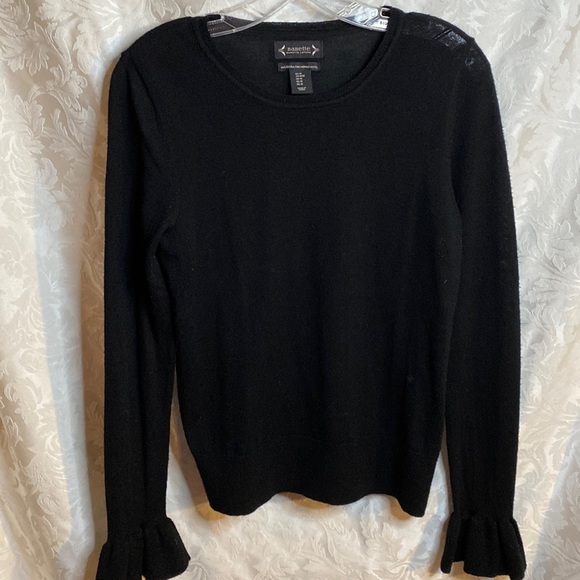 Nanette Lepore Sweaters - Nenette Lepore  M 100% extra fine Marino wool black sweater ruffle wrist sleeves
